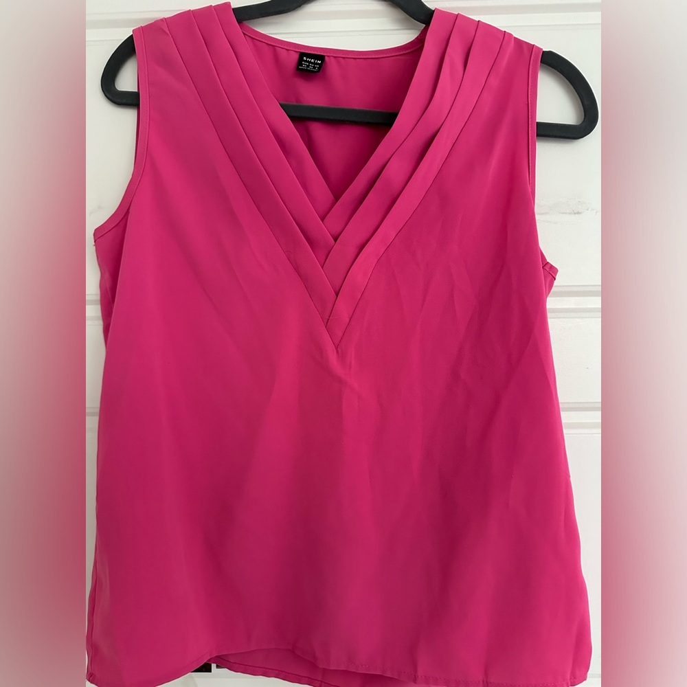fuchsia sleeveless blouse